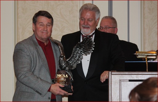 MCAA Past-President Tom Daniel presented the 2010 C. DeWitt Brown Leadman Award to Bill Holden, president of Birmingham, Ala.-based Block USA, during the MCAA Closing Banquet.
