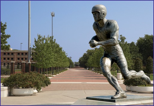 Shown is the view looking north of Doak Walker Plaza, located outside the northeast corner of Gerald J. Ford Stadium.