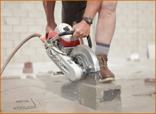 The TPX-40 Supreme Grade wet/dry diamond blade cutting through block