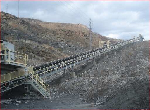 Freshly quarried rock is dumped into a jaw crusher and crushed into 7” pieces.