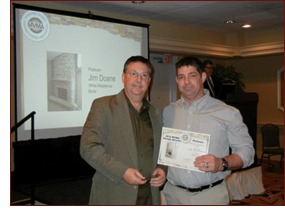 Dan is shown left with an award winner, Jim Doane