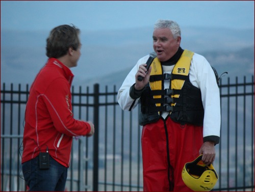 After a successful jump, John Smith addresses the crowd.