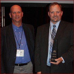 Rick Dahl of Mortenson Construction (left); Institutional winner – Lakewood Cemetery Garden Mausoleum