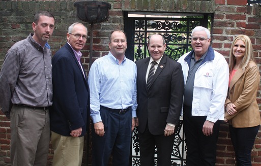 Shown are Paul Oldham, Paul Odom, Mike Sutter, Rep. Reid Ribble (R-WI), John Smith Jr., and Jennifer Morrell at a reception in D.C.