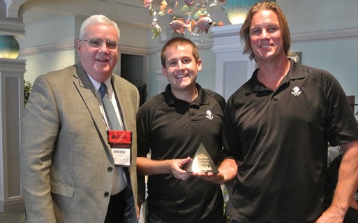 MCAA Chairman John Smith (left) presents the first place MCAA Safety Advantage Award for over 100,000 hours to Everett Pleasant (center) and Lance Little (right) from Stone Cold Masonry in Phoenix at the MCAA Board Meeting.