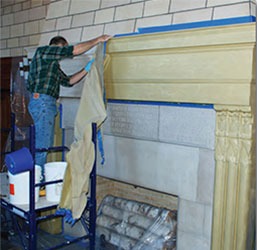 cleaning the water stains and overall soiling on the walls of the George W. Norris Legislative Chamber