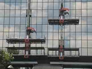 Los Angeles Public Works Building, Los Angeles, CA Several stacked Fraco platforms with portable cranes were used for anti-seismic retrofit works. All windows were replaced.