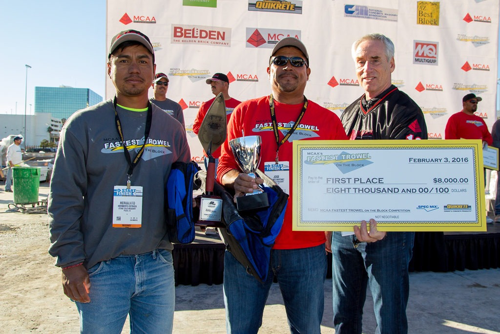 2016 Fastest Trowel on the Block winner Jose Noe Martinez (center) with tender Heriberto Estrada (left) is presented the $8,000 grand prize from MCAA Chairman Mark Kemp (right).