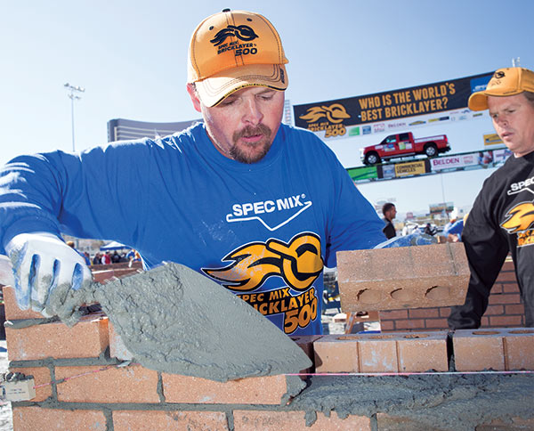 First Place winner of the SPEC MIX BRICKLAYER 500, Scott Tuttle (foreground), with his brother and mason tender, Brian Tuttle.