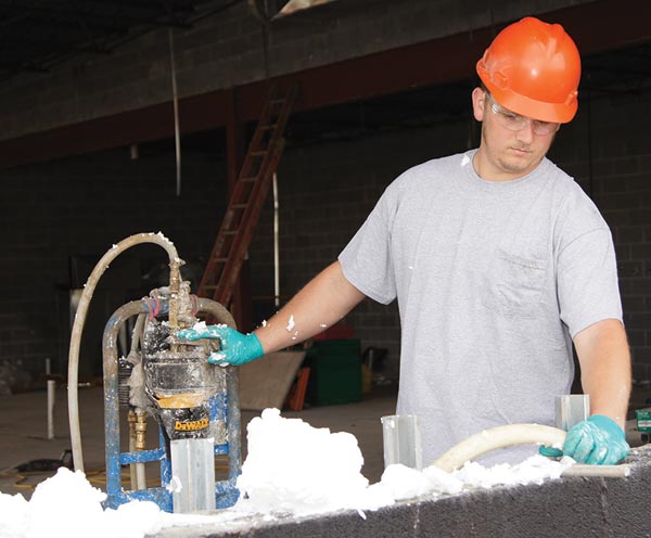 Aminoplast masonry foam fills the nooks and crannies inside CMU walls for enhanced thermal and acoustical performance of CMU building designs.