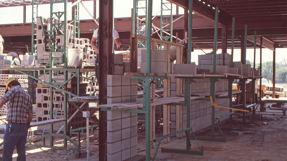 This photo was from one of Breithaupt’s last jobs in 1981. The Heavy-Duty was being used inside to build a gymnasium. The very first Workhorse scaffolding is seen on the right on the corridor walls. There was nothing like it at the time, and the current Workhorse is gaining widespread popularity for interior work.